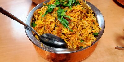 Chicken Biryani - Aromatic rice with spices at Daksh Restaurant
